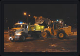 Snow removal with front end loader and dump truck